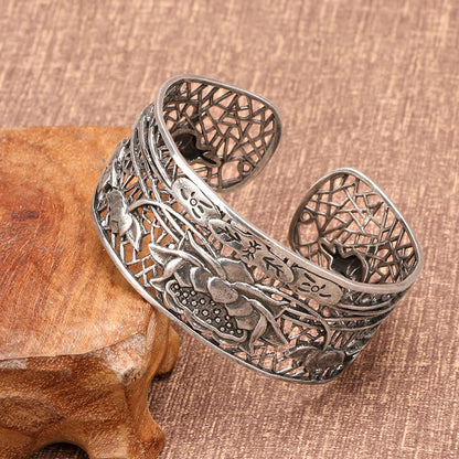 Bracelet jonc de guérison et d'illumination en cuivre plaqué argent avec pierres de Bouddha et lotus creux