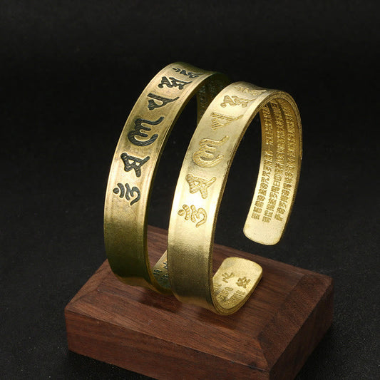 Bracelet manchette en cuivre avec six mots authentiques « om mani padme hum » et « sūtra du cœur »