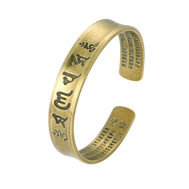 Bracelet manchette en cuivre avec six mots authentiques « om mani padme hum » et « sūtra du cœur »