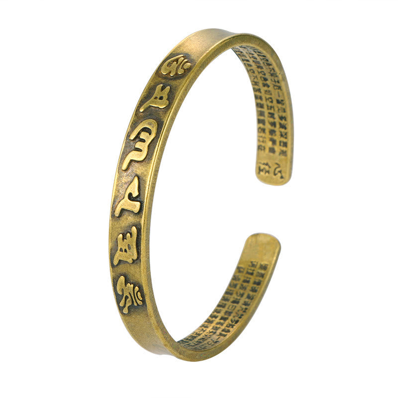 Bracelet manchette en cuivre avec six mots authentiques « om mani padme hum » et « sūtra du cœur », symbole de la sagesse et de la paix