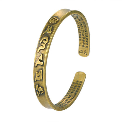 Bracelet manchette en cuivre avec six mots authentiques « om mani padme hum » et « sūtra du cœur », symbole de la sagesse et de la paix