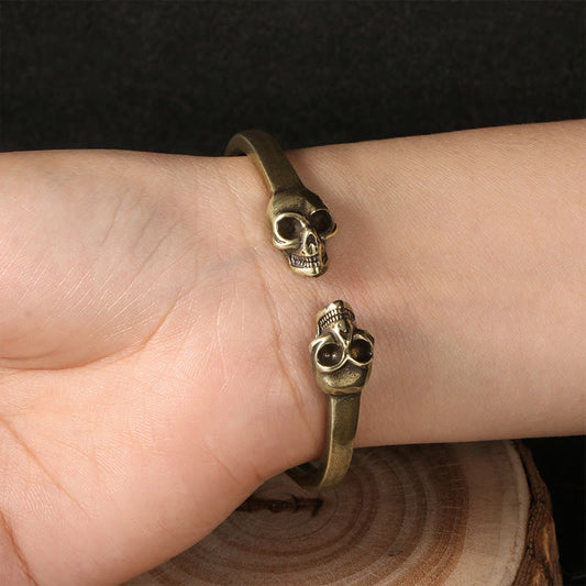 Bracelet manchette en cuivre avec double tête de mort et pierres de Bouddha, le Seigneur de la forêt des cadavres, pour éloigner les mauvais esprits