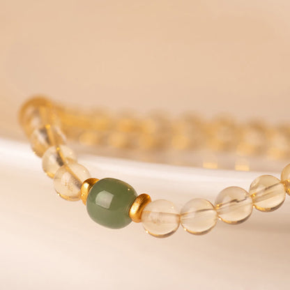 Bracelet de prospérité en petites perles de jade et de citrine de Bouddha Stones