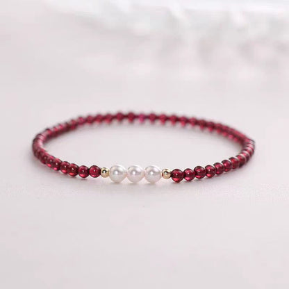 Bracelet de protection en petites perles de grenat naturel Buddha Stones