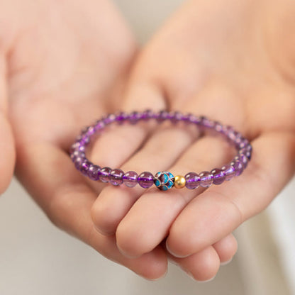 Bracelet de conscience spirituelle en améthyste naturelle et lotus en pierres de Bouddha