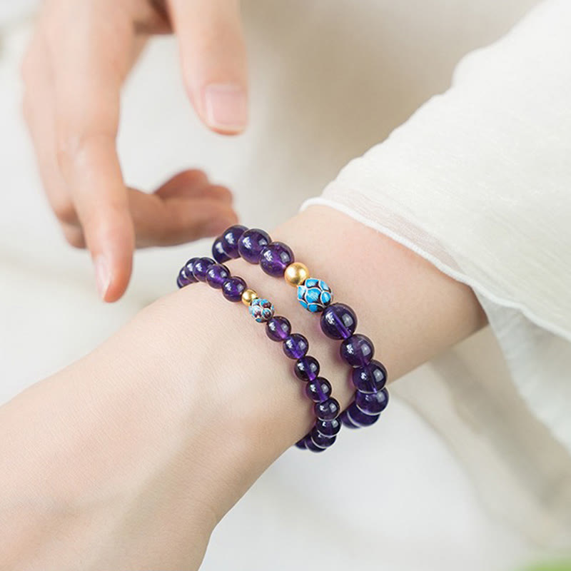 Bracelet de conscience spirituelle en améthyste naturelle et lotus en pierres de Bouddha