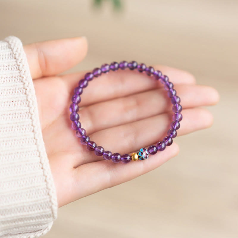 Bracelet de conscience spirituelle en améthyste naturelle et lotus en pierres de Bouddha