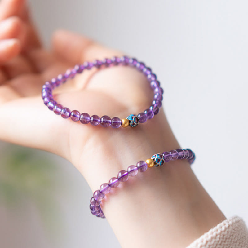 Bracelet de conscience spirituelle en améthyste naturelle et lotus en pierres de Bouddha