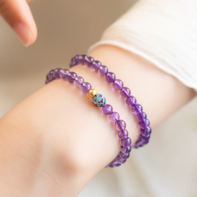 Bracelet de conscience spirituelle en améthyste naturelle et lotus en pierres de Bouddha