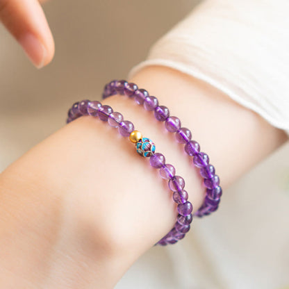 Bracelet de conscience spirituelle en améthyste naturelle et lotus en pierres de Bouddha