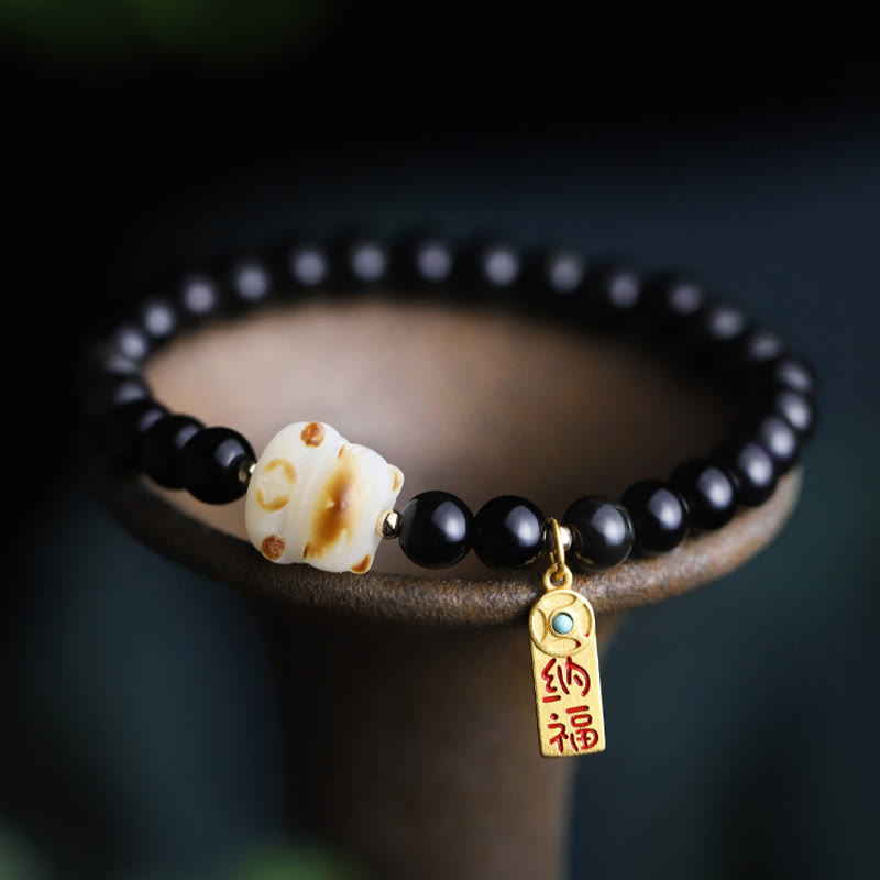 Bracelet porte-bonheur et de purification en obsidienne noire, motif patte de chat, graine de Bodhi