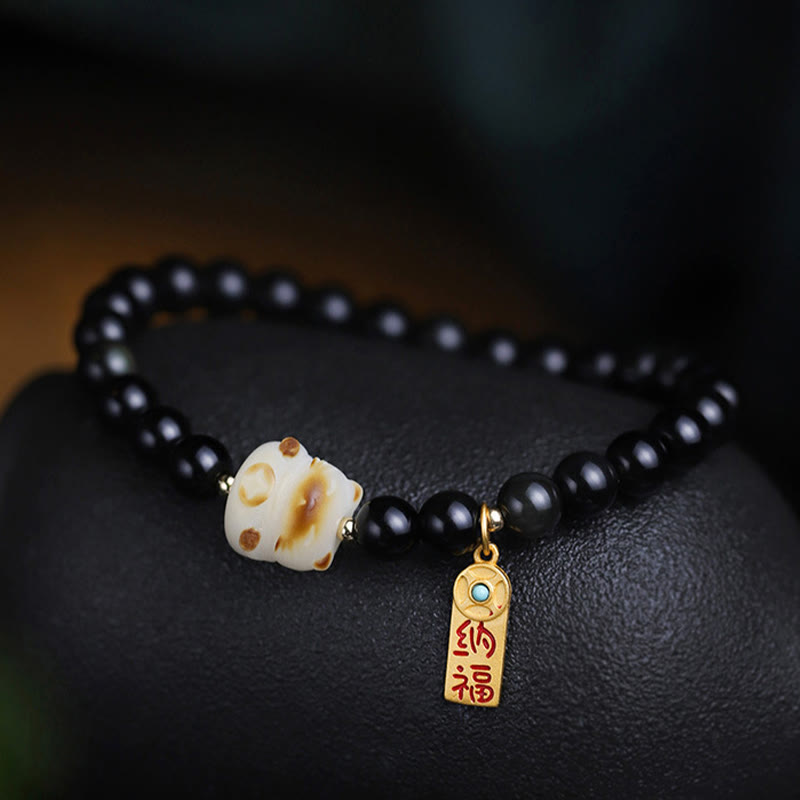 Bracelet porte-bonheur et de purification en obsidienne noire, motif patte de chat, graine de Bodhi