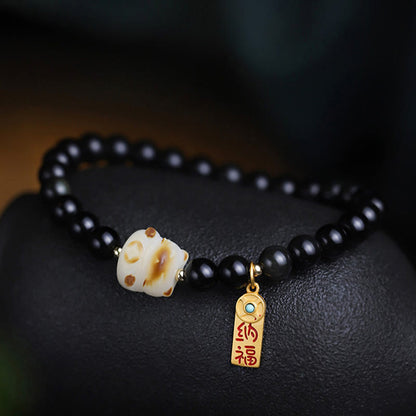 Bracelet porte-bonheur et de purification en obsidienne noire, motif patte de chat, graine de Bodhi