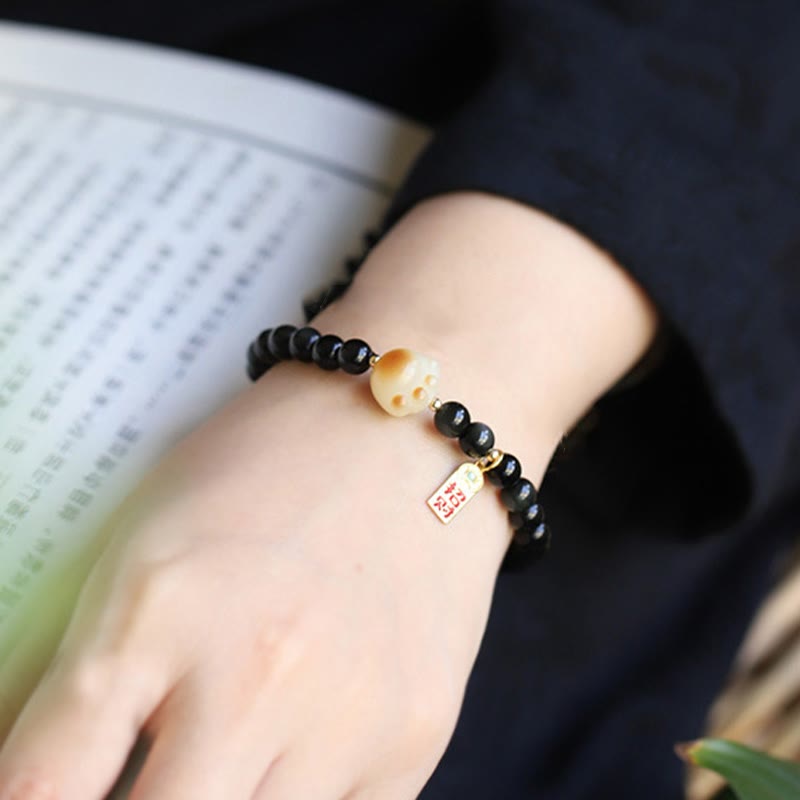 Bracelet porte-bonheur et de purification en obsidienne noire, motif patte de chat, graine de Bodhi