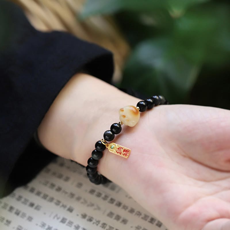 Bracelet porte-bonheur et de purification en obsidienne noire, motif patte de chat, graine de Bodhi