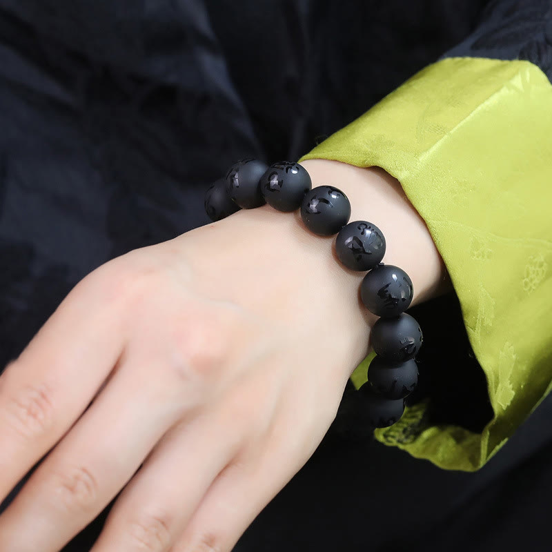 Bracelet de protection sculpté en onyx noir naturel avec pierres de Bouddha Om Mani Padme Hum