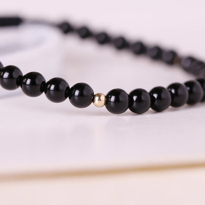 Bracelet en corde d'accomplissement avec petites perles d'obsidienne noire et pierres de Bouddha