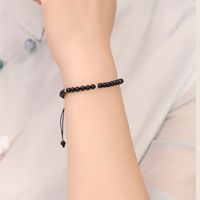 Bracelet en corde d'accomplissement avec petites perles d'obsidienne noire et pierres de Bouddha