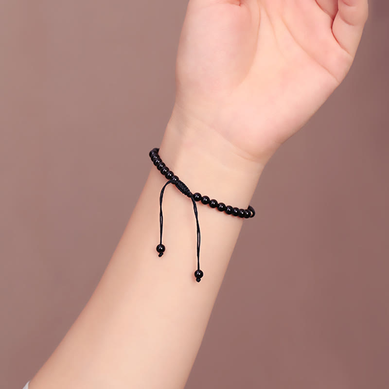 Bracelet en corde d'accomplissement avec petites perles d'obsidienne noire et pierres de Bouddha