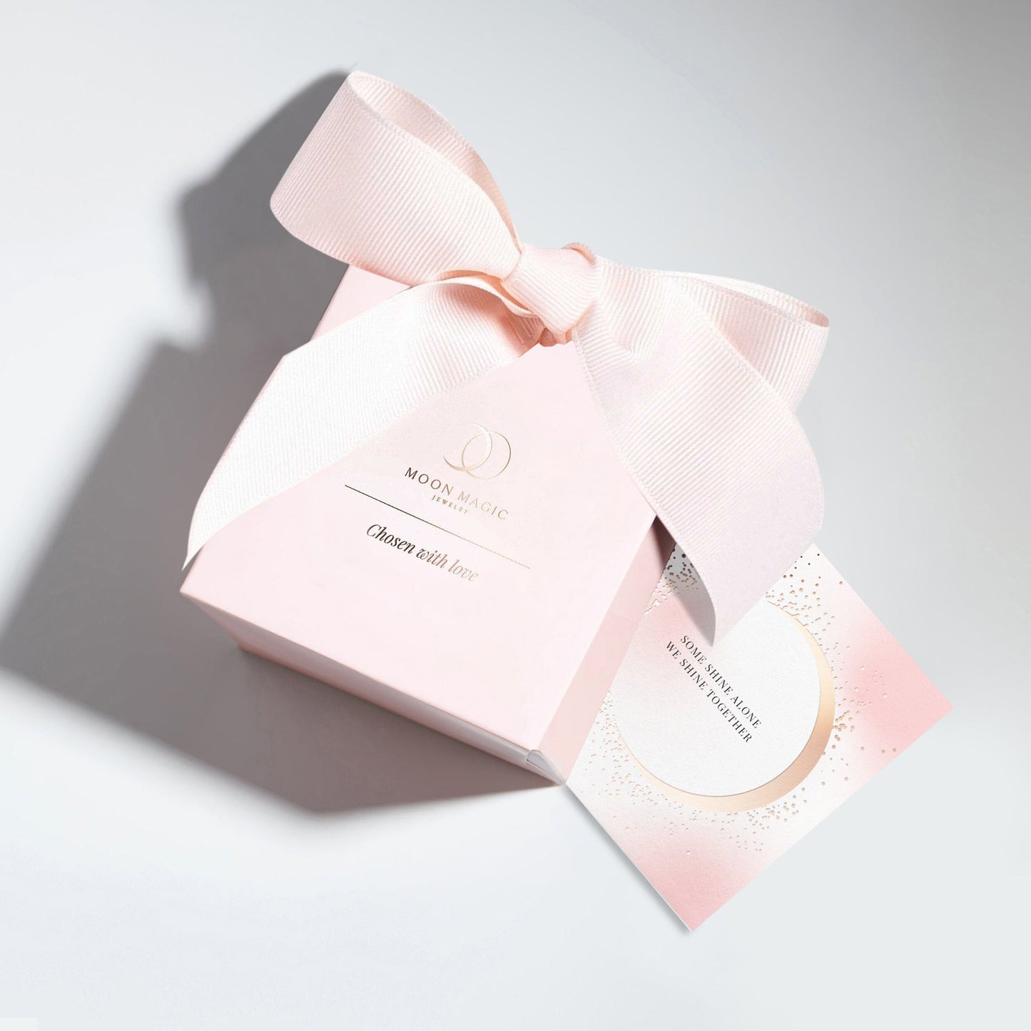 Ensemble sac cadeau et carte rose clair