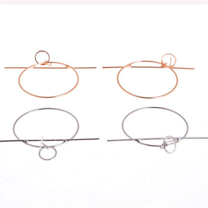 Boucles d'oreilles créoles et barres géométriques