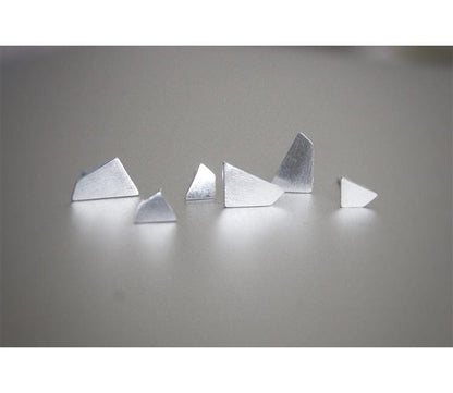 Boucles d'oreilles à tige polygonales abstraites