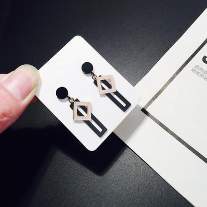 Boucles d'oreilles pendantes géométriques